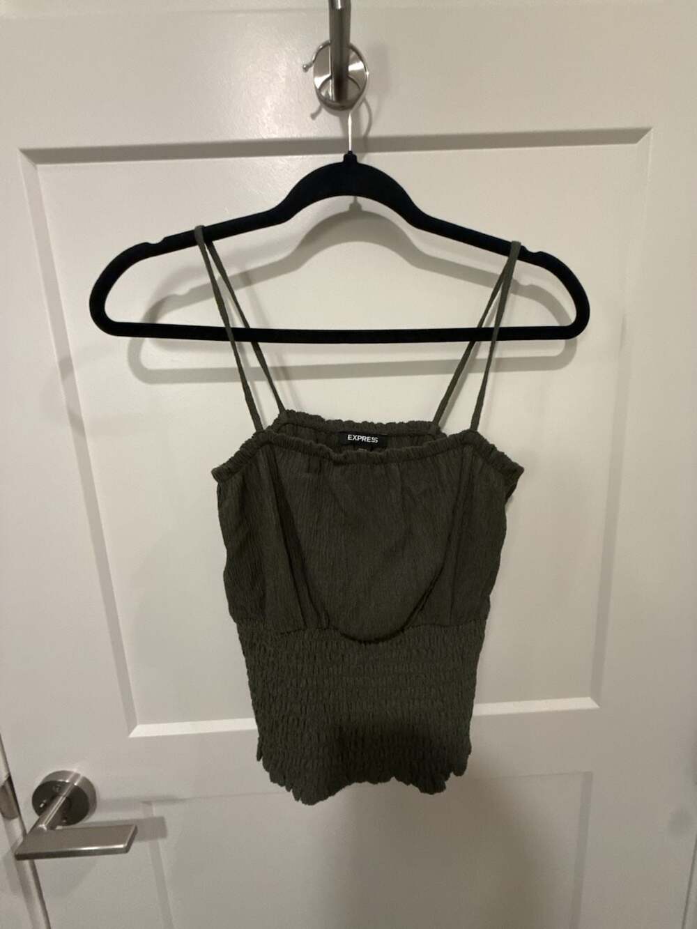 army green top with ties to adjust over the...